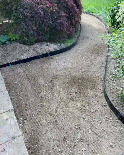 Before: path dug out, graded and edged